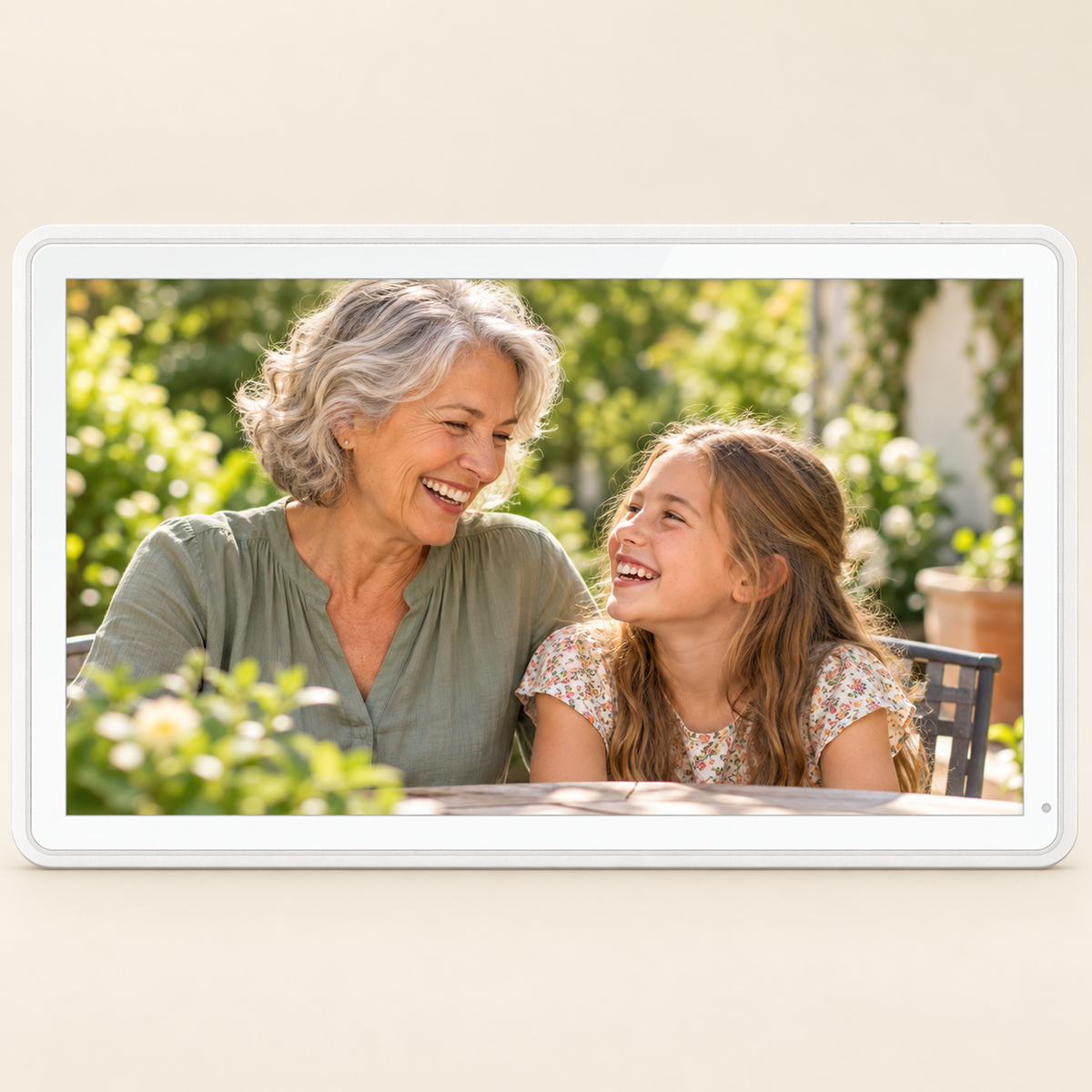 White Guardian 15.6-inch frame displaying a grandmother and granddaughter sharing a happy moment